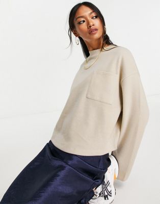 ASOS DESIGN super soft oversized sweater with pocket detail in warm cream
