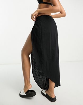 ASOS DESIGN natural asymmetric beach skirt with twist front in black