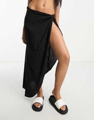 ASOS DESIGN natural asymmetric beach skirt with twist front in black