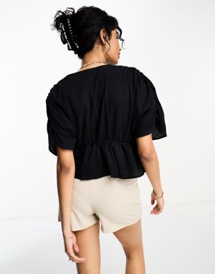 ASOS DESIGN plunge front crinkle top with tie side in black
