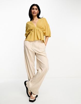 ASOS DESIGN plunge front crinkle top with tie side in ochre