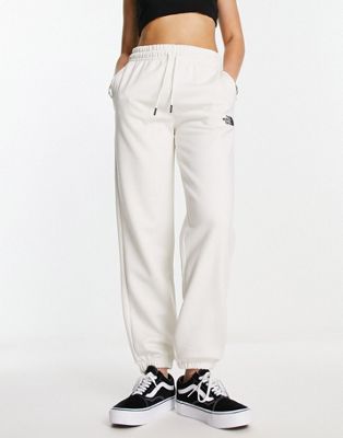 The North Face Essential oversized sweatpants in cream Exclusive to ASOS
