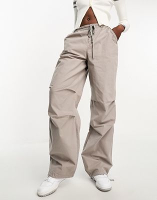 ASOS DESIGN Tall parachute cargo pants with tie waist in washed stone