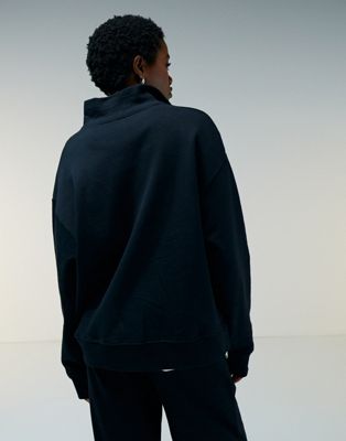 ASOS DESIGN half zip sweatshirt in black