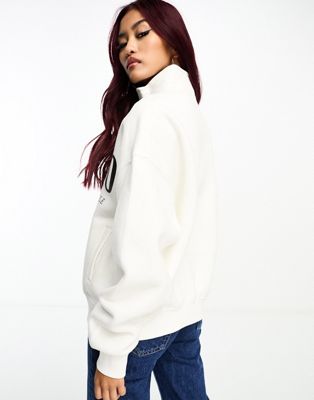 Bershka 1/4 zip slogan sweatshirt in white